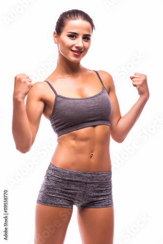 Young sport girl show power of hand muscle