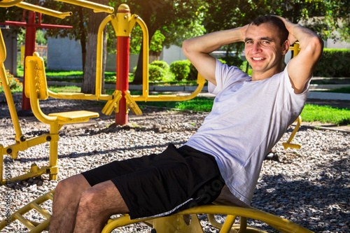 Young man working out outdoor photo