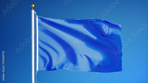 Light blue flag waving against clean blue sky, close up, isolated with clipping mask alpha channel transparency, perfect for film, news, digital composition