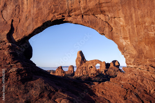 Scenic view of rock formations against clear sky photo