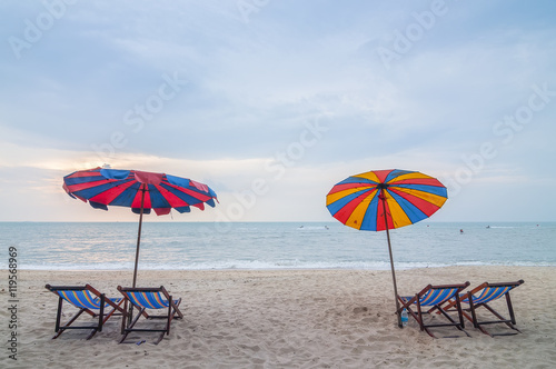 Wallpaper Mural Beach chairs with umbrella and beautiful beach on a cloudy da Torontodigital.ca