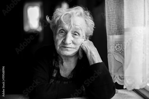 Black and white portrait of an elderly woman, close-up...