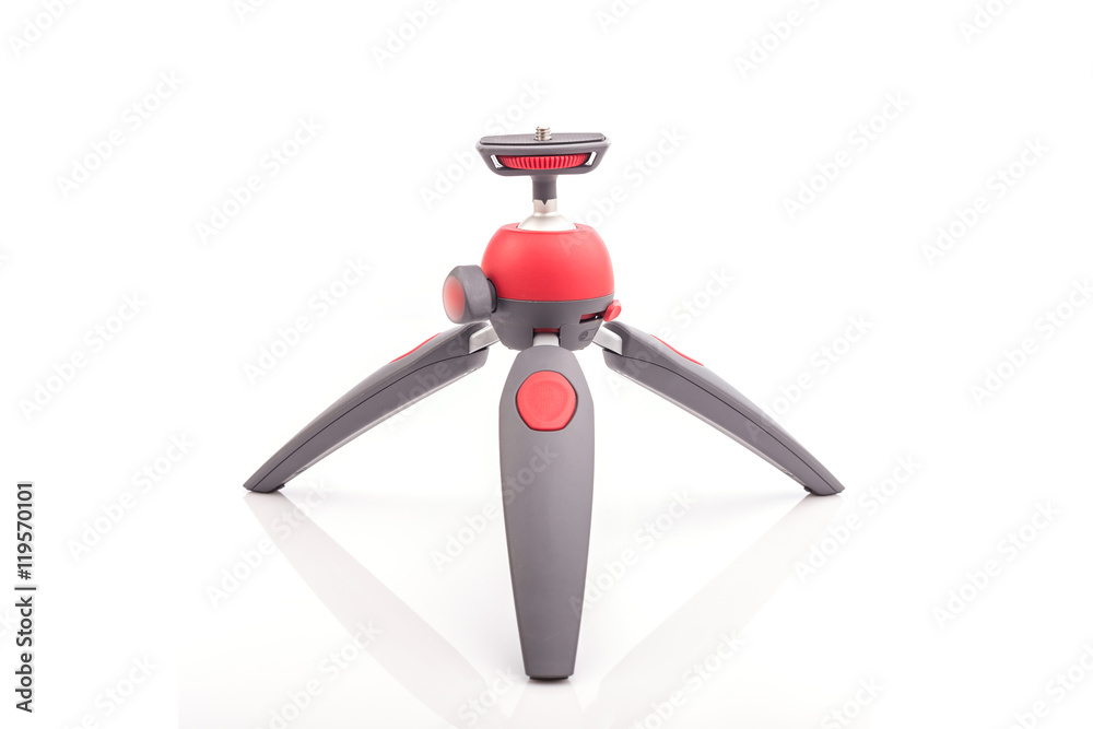 Fototapeta premium Mini tripod for camera isolated on white background