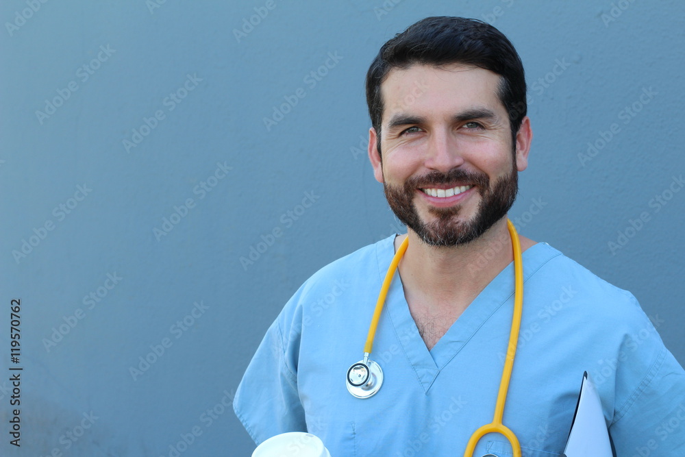 Health is the biggest priority. Studio portrait of a young male nurse smiling with confidence isolated on blue Health is the biggest priority. Studio portrait of a young male nurse smiling with confidence isolated on blue