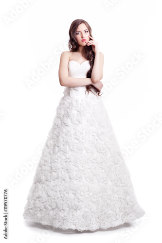 Portrait of beautiful young brunette woman bride  in white Wedding dress