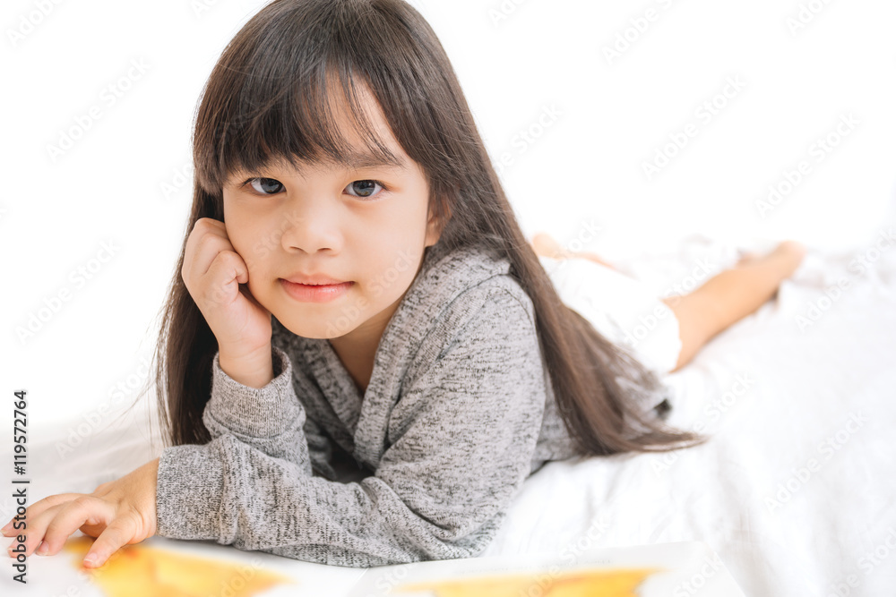 portrait asia children, education and school concept -student girl reading book portrait asia children, education and school concept -student girl reading book