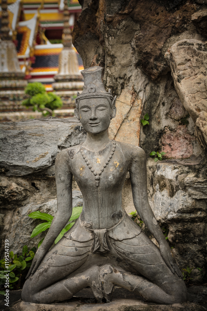Fototapeta premium Contortionist hermit statue in wat pho ,Bangkok Thailand.
