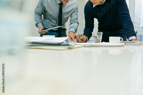 Cropped image of business team working in office