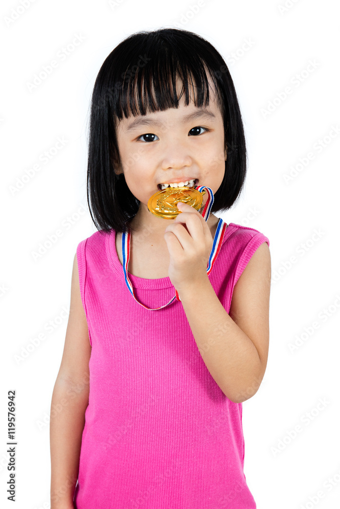 Asian Chinese little girl biting gold medal Asian Chinese little girl biting gold medal
