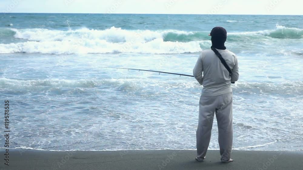 Man fishing on beach near sea, super slow motion 240fps
Man fishing on beach near sea, super slow motion 240fps