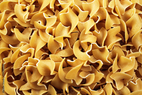 A close up image of flat egg noodles