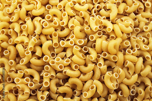 A close up image of elbow macaroni noodles photo