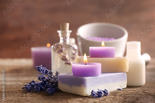Beautiful spa composition with lavender on wooden table