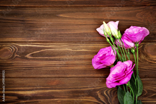 Fototapeta Naklejka Na Ścianę i Meble -  Fresh flowers on  wooden background