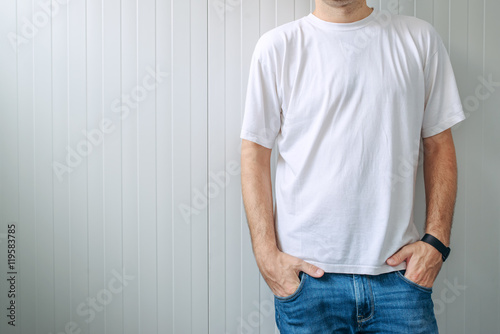 Casual man in jeans trousers and white t-shirt