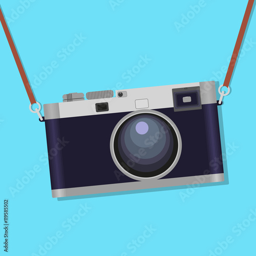 Old photographic camera over BLUE background
