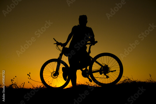 sunset and silhouette backlight bikers