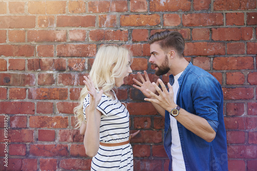 Bilde på lerret Young couple arguing very loudly