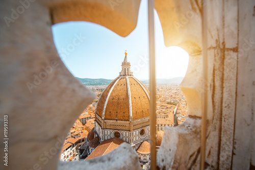 View through the gothic rose window on Duomo cathdral in Florence photo