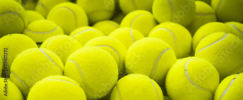 Lots of vibrant tennis balls © gargantiopa