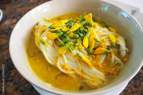 Num Banh Chok, or Traditional Cambodian Rice Noodles Topped with Herbs