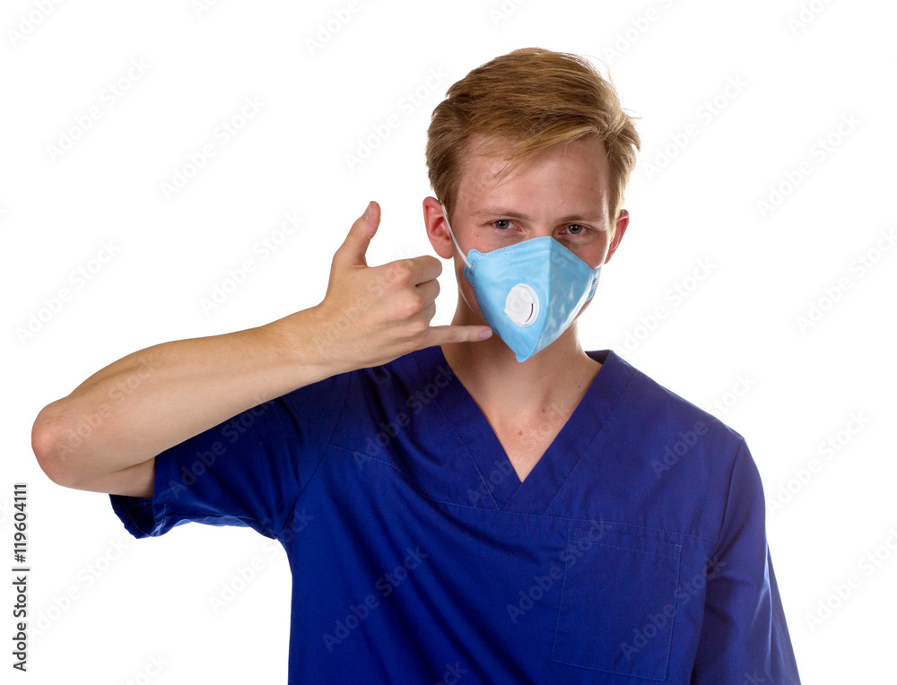 Portrait of a charming medical doctor gesturing call me with his Portrait of a charming medical doctor gesturing call me with his
