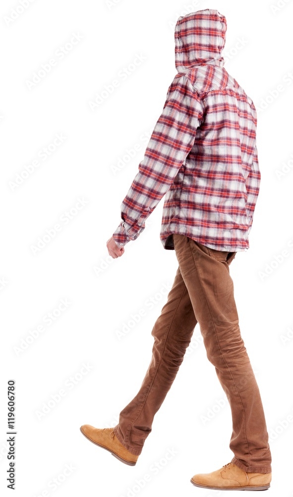 Naklejka premium Back view of going guy in a plaid shirt with hood. walking young guy in jeans and jacket. Rear view people collection. backside view of person. Isolated over white background.