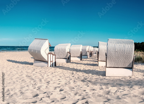 Fototapeta Naklejka Na Ścianę i Meble -  Traditional wooden beach chair on island Rugen on Baltic sea 