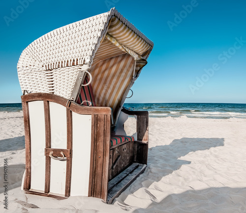 Traditional wooden beach chair on island Rugen on Baltic sea 