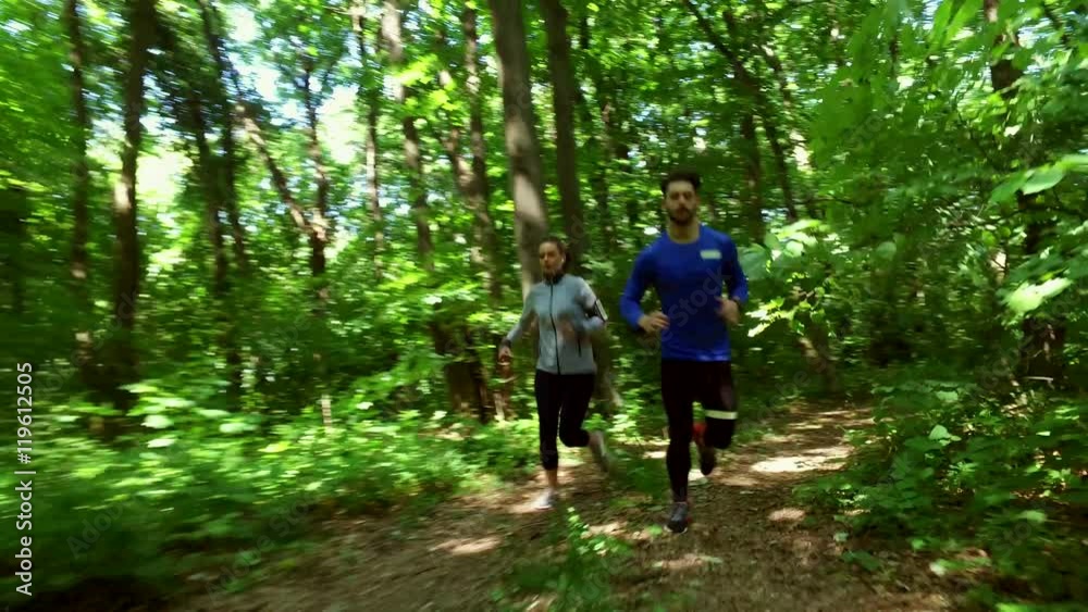 Runners - running jogging in forest. People training, running, jogging, fitness, runner-4k video Runners - running jogging in forest. People training, running, jogging, fitness, runner-4k video