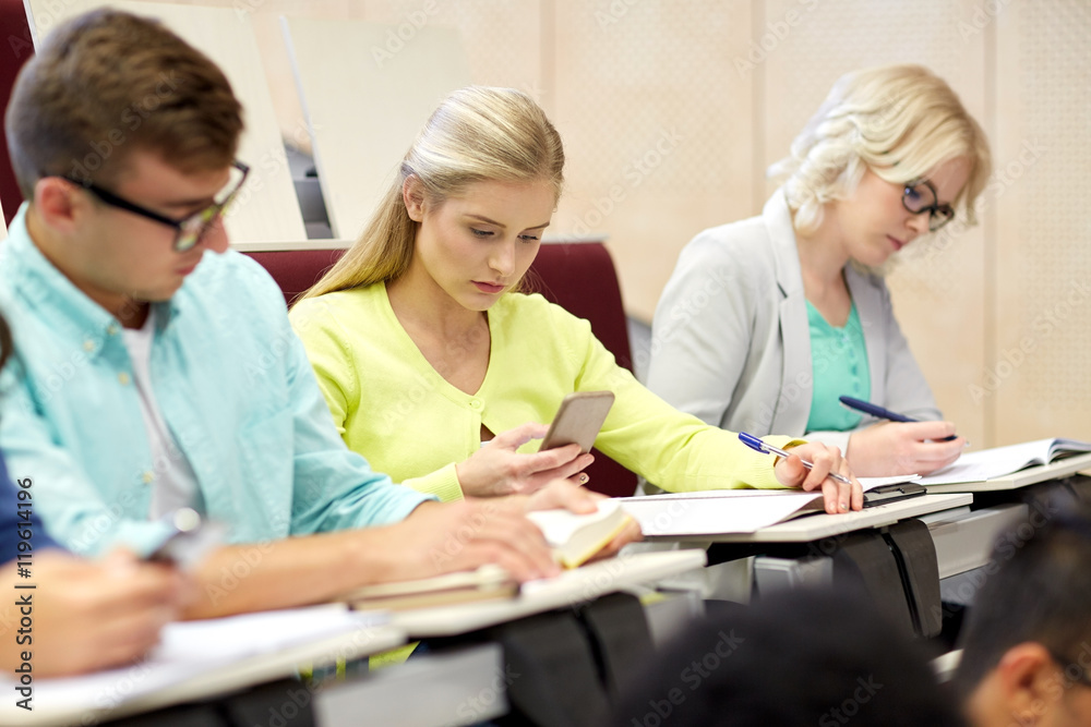 student girl with smartphones at lecture student girl with smartphones at lecture