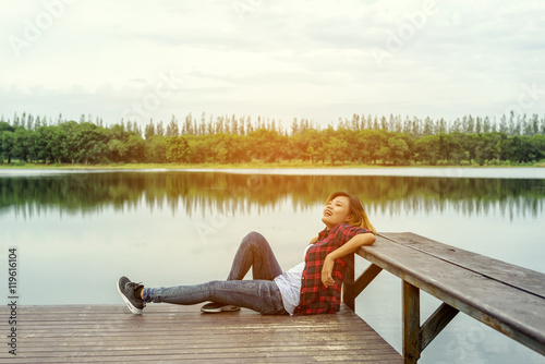 lifestyle concept - beautiful happy woman enjoying fresh air on