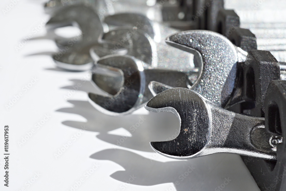 Isolated Set of silver monkey wrenches (shifting or adjustable spanners) as a symbol of manual construction or repair works at the households Isolated Set of silver monkey wrenches (shifting or adjustable spanners) as a symbol of manual construction or repair works at the households