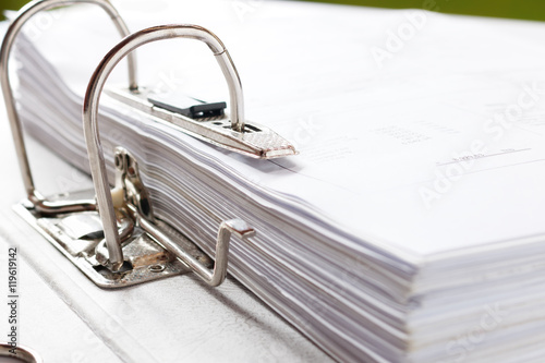 Close up of a business file folder with documents  storage of co