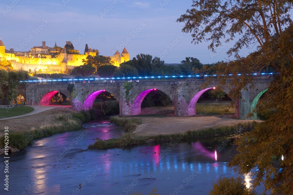 Carcassonne city and the Old bridge at night in France