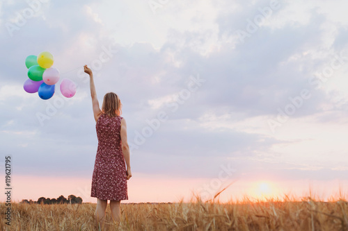 Quadro em tela hope concept, emotions and feelings, woman with colourful balloons in the field,