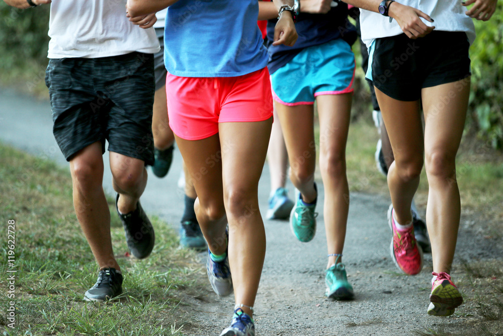 Group of runners training together outside Group of runners training together outside