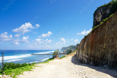 Melasti beach in bali, indonesia. Melasti hidden beach in bali. Near tanah lot beach photo