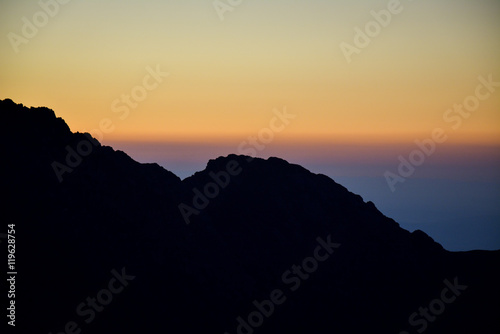 Mountains silhouettes scenery in the evening colors © icephotography