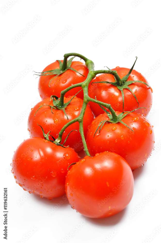 Red tomatoes with cut isolated on white Red tomatoes with cut isolated on white