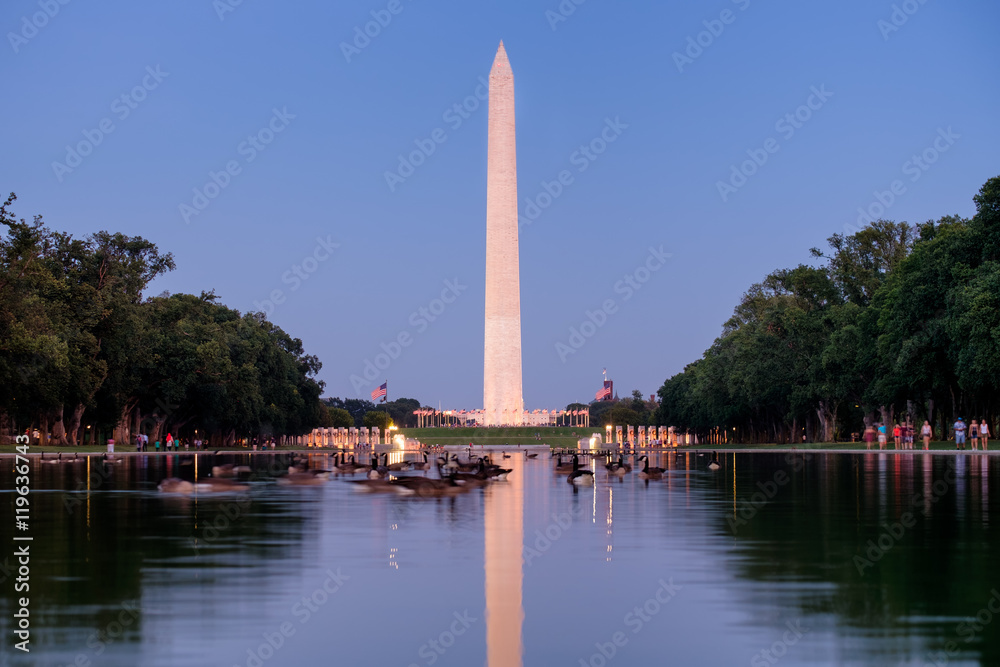 The Washington Monument illuminated at sunset