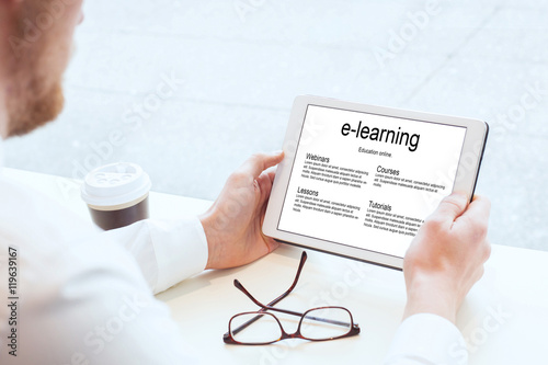 e-learning, business education online, hands with tablet