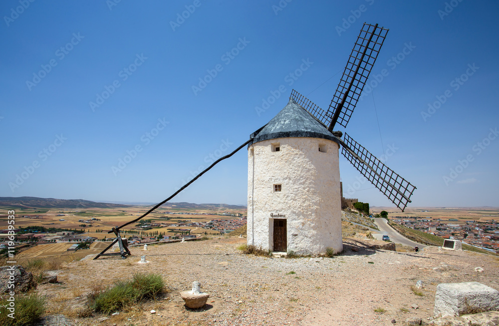 Windmill isolated in Campo de Criptana. La Mancha, Consuegra, Don Quixote route, Spain, Europe Windmill isolated in Campo de Criptana. La Mancha, Consuegra, Don Quixote route, Spain, Europe