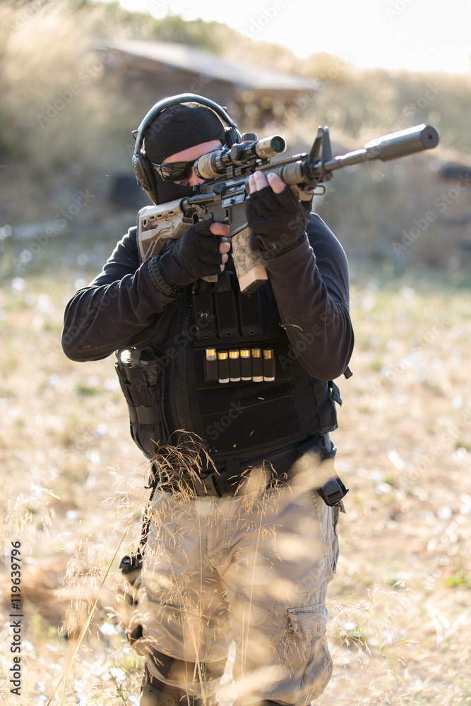 Fototapeta premium mercenary with weapon