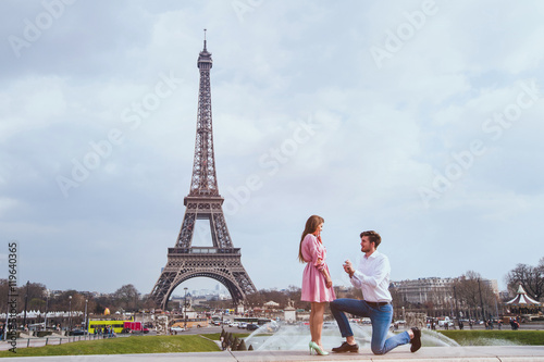 romantic proposal in Paris, engagement © Song_about_summer