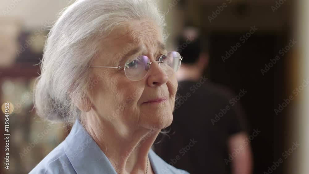 A senior woman who is a victim of elder abuse is in fear while an abusive man glares at her. Shot in 4K UHD. A senior woman who is a victim of elder abuse is in fear while an abusive man glares at her. Shot in 4K UHD.