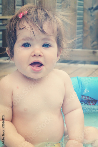 Sweet baby palying in pool - instagram effect