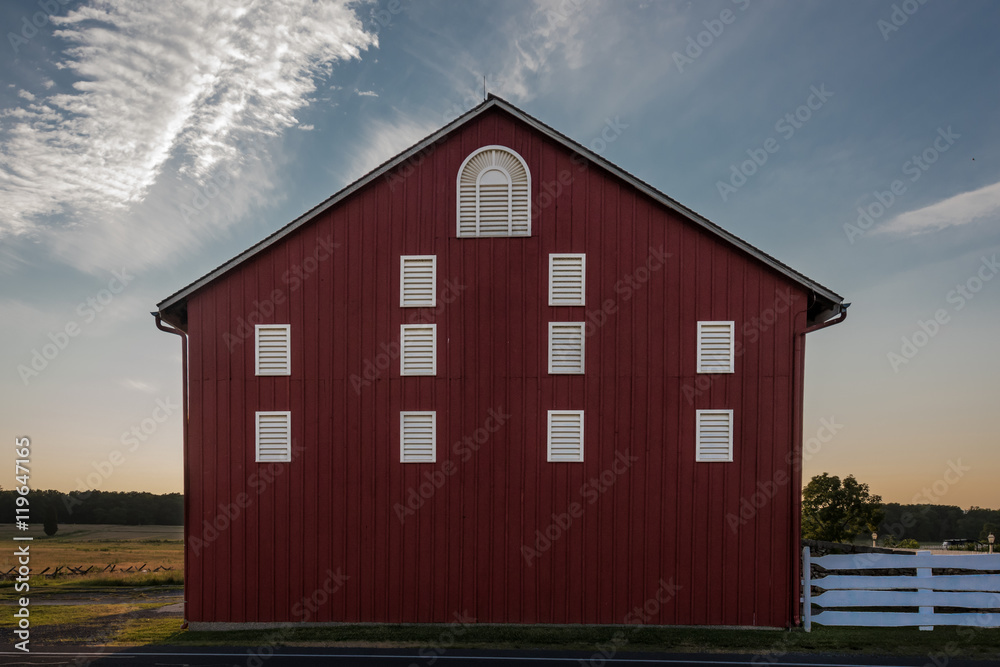 Red Pennsylvania Barn Side At Sunset