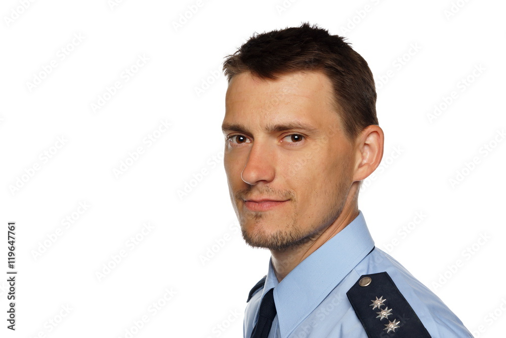 Portrait of young policeman in uniform, left you can write some text Portrait of young policeman in uniform, left you can write some text