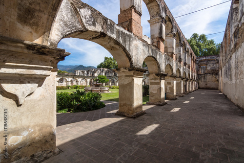 Arches looking out into the cloister of Iglesia y Convento de Santa Clara in Antigua Guatemala (Guatemala)
